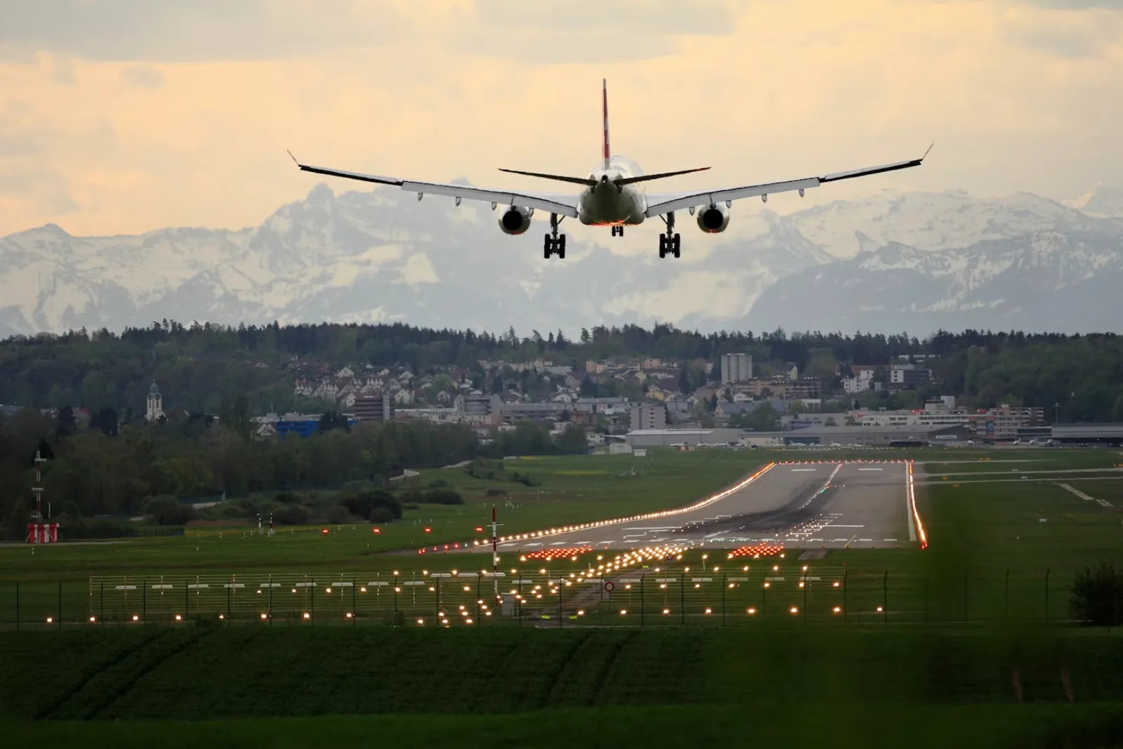 Aircraft approaching a runway representing air traffic support services